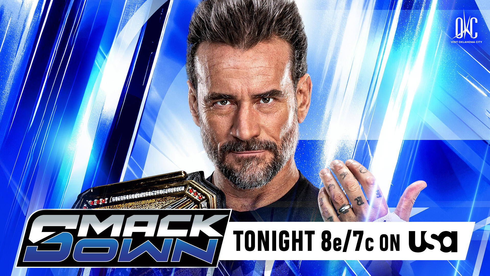 CM Punk appears with the WWE championship on SmackDown